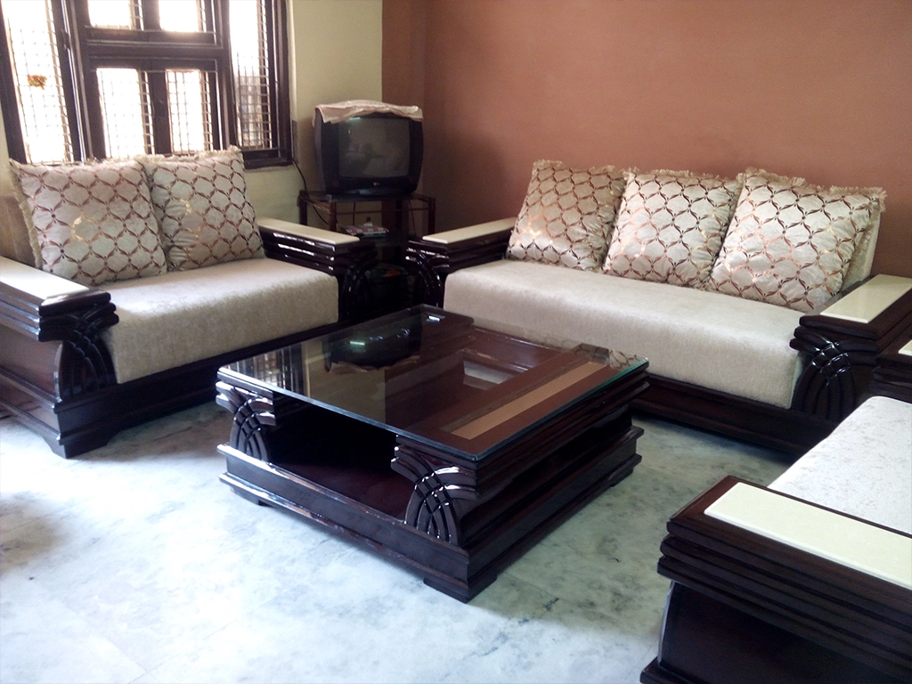 One compete sofa set with center table with brown polished.