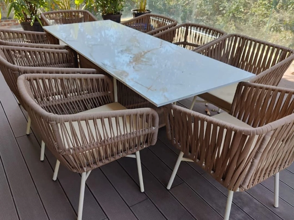 Outdoor rope design chair beige color dining set with beige color cushion, base white color powder coated, Table marble top.