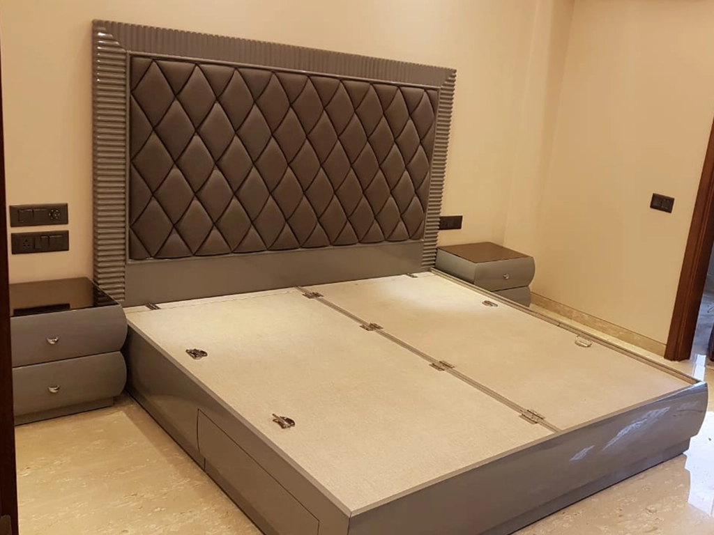 A compete cushioned brown color double bed with side table PU polish finish for Bed room.