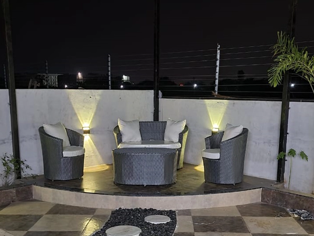 Outdoor roof top wicker sofa set grey color with white color pillow and cushion 2+1+1+table