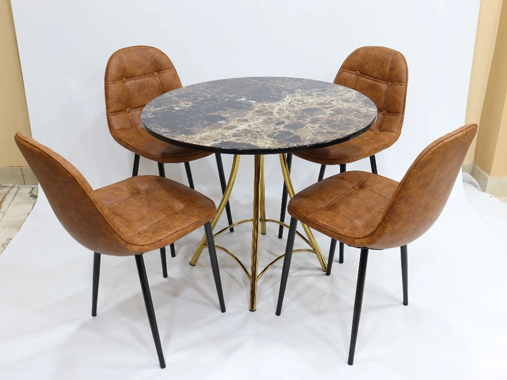 four pcs dinning chair with one round table. chair upholstered with leatherette and cushion, metal powder coated legs. Table metal base with pvd electroplated finish, top textured engineer wood finish.