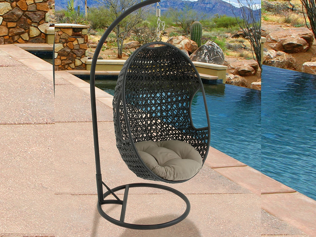 black color single seater swing chair with beige color cushion for rooftop.