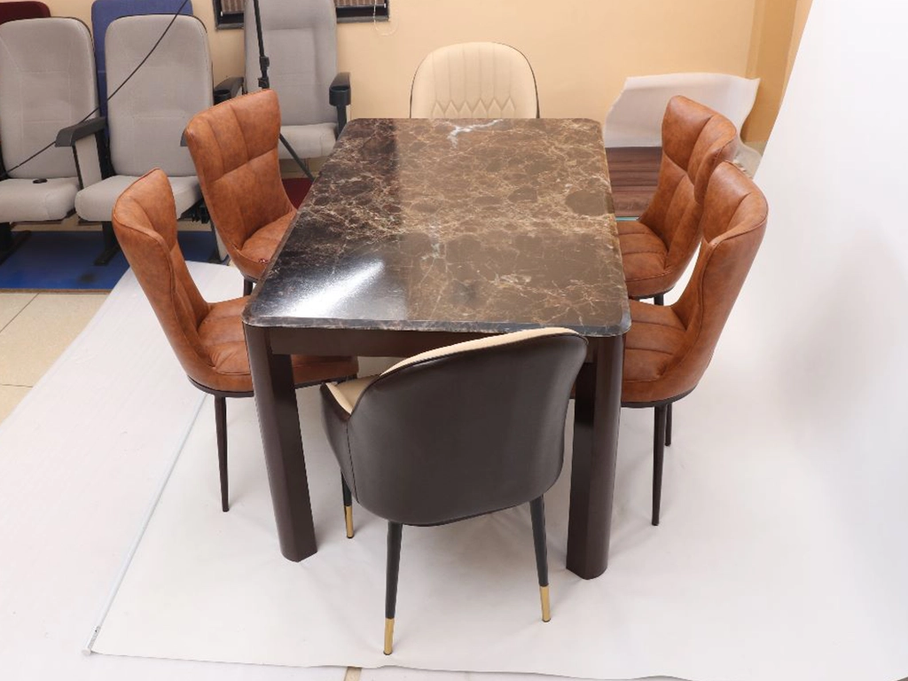 Six pcs dinning chair with rectangular table. chair upholstered with leatherette, metal powder coated legs. Table metal base with powder coted finish, top textured engineer wood finish.